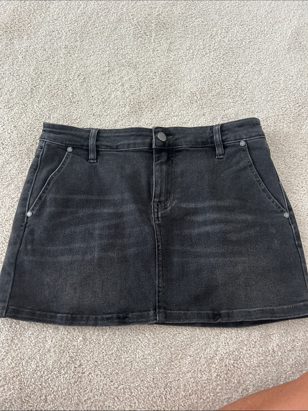 Washed Black Denim Mini Skirt with Front Pockets